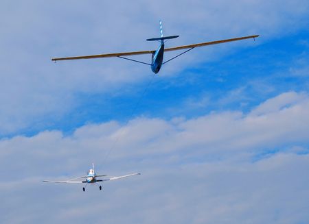 towplane and glider in flightの写真素材