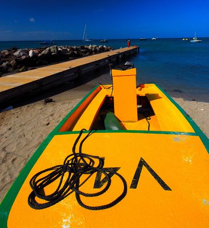 boat on a tropical beachの写真素材