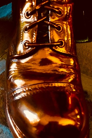 Bronze military bootの写真素材