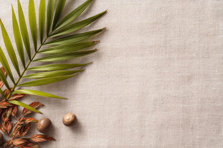 Coconut leaves and eggs on linen background. Flat lay, top view.の写真素材
