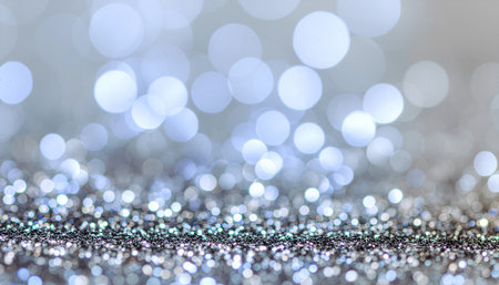 silver glitter christmas abstract background. bokeh defocused lightsの素材