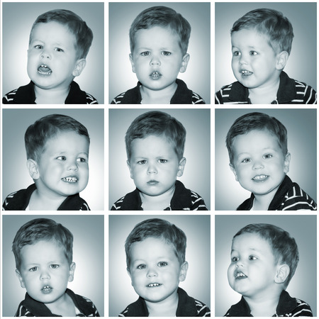 Little boy doing facial expressionsの写真素材