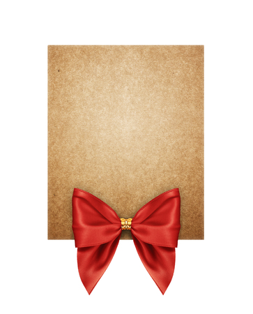 Piece cardboard with a bow isolated on whiteの写真素材