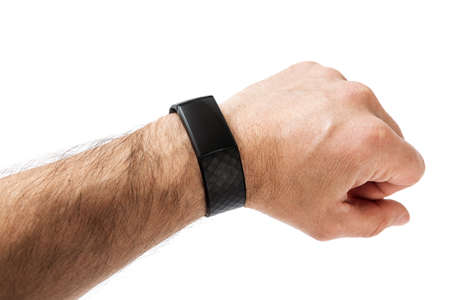Hand with fitness activity tracker isolated on white backgroundの写真素材