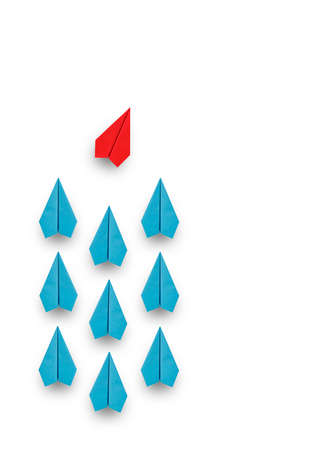 Red paper plane leading a group of blue paper planes changes direction, Business concept