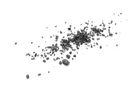 Black volcanic salt on white background