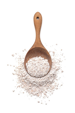 Heap of perlite for hydroponics vegetable in wooden spoon on white backgroundの写真素材