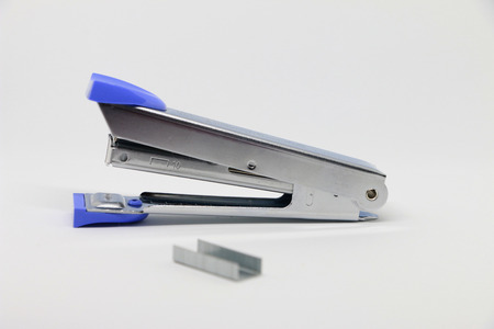 Stapler on the white background. Miscellaneous of office equipment. Paper clip,Staplerの写真素材