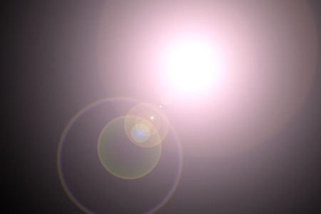 Sun light effect on the black color background ,Sun light illustration backgroundの写真素材
