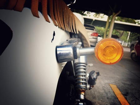Turn light signal of motorcycle with vintage color styleの写真素材