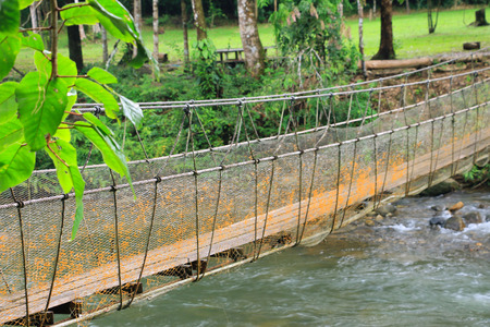 Rope bridge ,wood bridge on the riverの写真素材