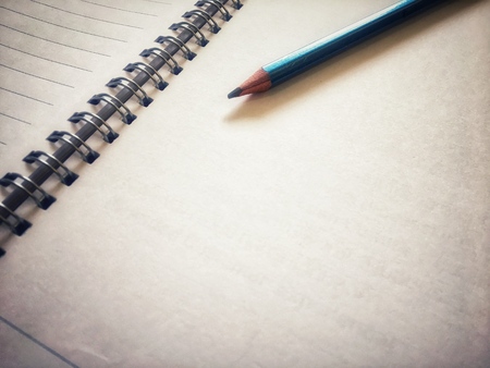 white Paper book and pencils with vintage color styleの写真素材