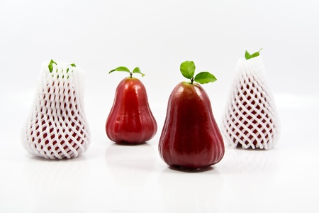 Rose apple packaging on a white background の写真素材