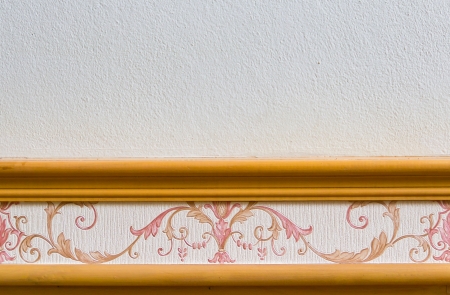 Wallpaper and wood trim on the walls の写真素材