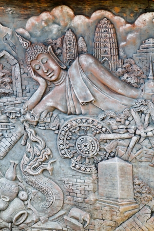 Stucco sculpture of religion on the wall in nongnuch garden thailandの写真素材