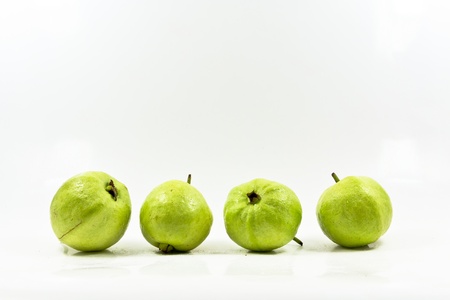 Raw guava on white background.