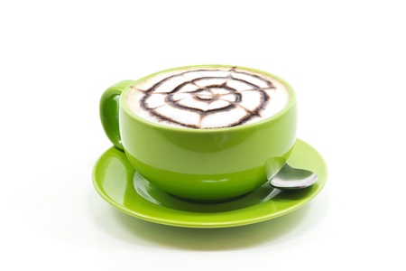 Cappuccino in a cup of green on a white background.の写真素材
