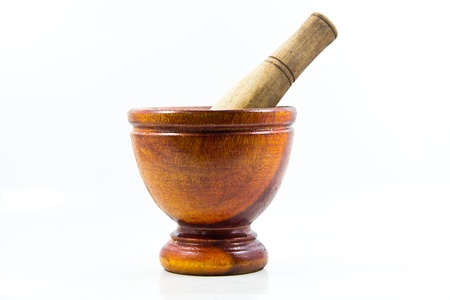 Wooden mortar on the white background の写真素材