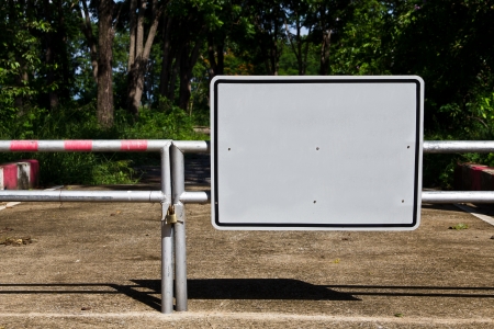 Empty billboard on a metal fence の写真素材