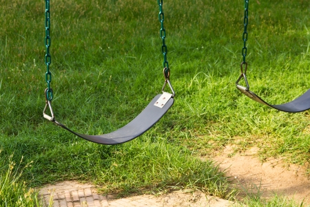 Swings in the playground の写真素材