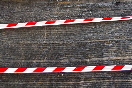 Red and white stripes on black mesh shading の写真素材