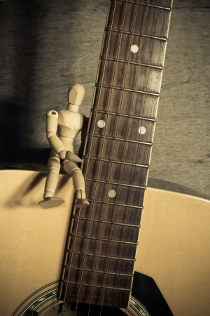 still life Photography with Wooden doll with guitar 