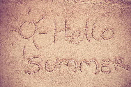 written on sand.sea and sand background.Concepcion tour over the summer.の写真素材
