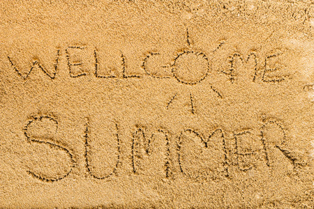 written on sand.sea and sand background.Concepcion tour over the summer.の写真素材