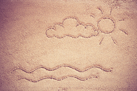 written on sand.sea and sand background.Concepcion tour over the summer.の写真素材