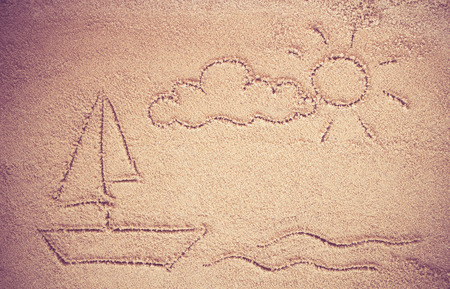 written on sand.sea and sand background.Concepcion tour over the summer.の写真素材