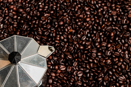 Hot coffee roasted with moka pot.roasted coffee beans.の写真素材