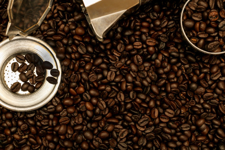 Hot coffee roasted with moka pot and stainless steel cup.roasted coffee beans.の写真素材