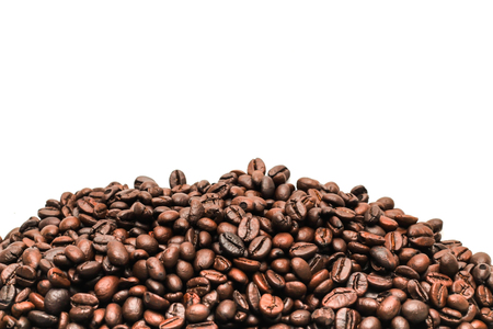 Roasted coffee beans on a white background with clipping path.の写真素材