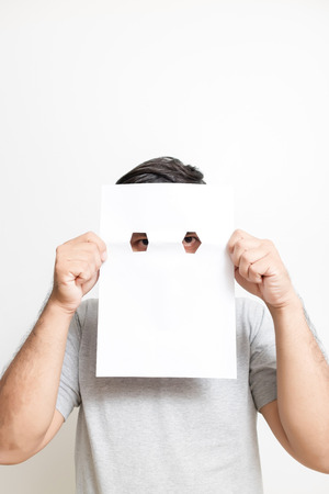 asian man with blank paper on white background.の写真素材