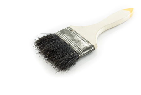 Old paint brush isolated on a white backgroundの写真素材
