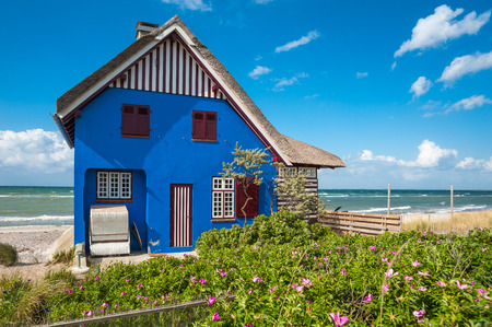 The blue House in the nature reserve Graswarder in Heiligenhafen, Baltic Sea, Schleswig-Holstein, Germany, Europeのeditorial素材