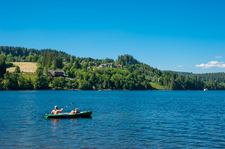 Canoeist on the Lake Titisee, Black Forest, Baden-Wuerttemberg, Germany, Europeのeditorial素材