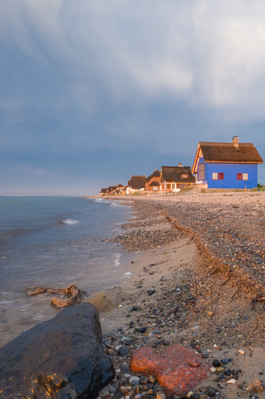 Holiday cottage on the peninsula and nature reserve Graswarder in Heiligenhafen at the Baltic Seaの写真素材