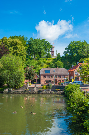 Pond in the historical center with view toward the tower Bismarckturm in Luetjenburg at the Baltic Seaのeditorial素材