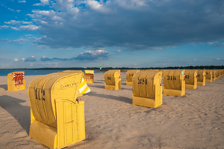 Beach with roofed wicker beach chairs in TravemÃ¼nde at the Baltic Seaの写真素材