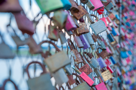 Love locks on the pier of Heiligenhafen at the Baltic Sea