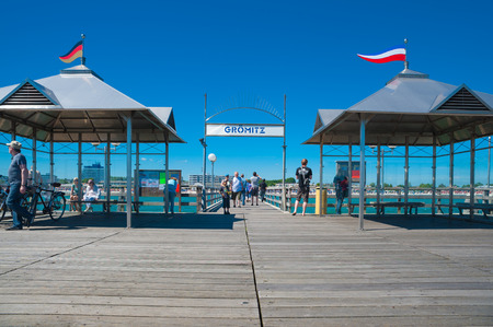 Pier with tourists in Groemitz at the Baltic Seaのeditorial素材