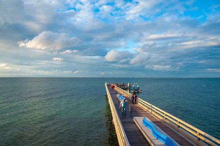 The pier with tourists in Heiligenhafen at the Baltic Seaのeditorial素材