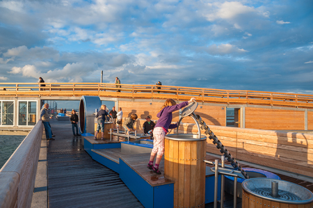 The pier with tourists in Heiligenhafen at the Baltic Seaのeditorial素材