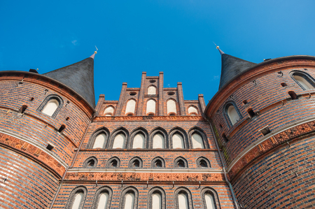 Historic Holsten Gate in Lubeck at the Baltic Seaのeditorial素材