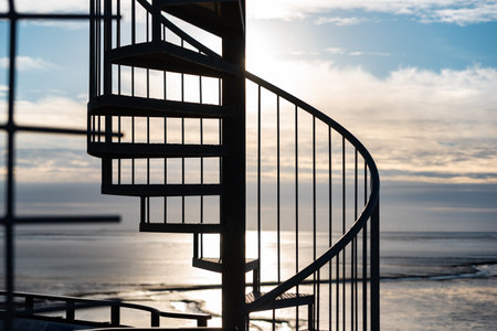 Spiral staircase at the Obereversand lighthouse with the Wadden Sea in the background. Dorum-Neufeld...