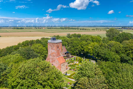 Aerial view with the Ochsenturm near Imsum on the German North Sea coast. The Ochsenturm is the rest...
