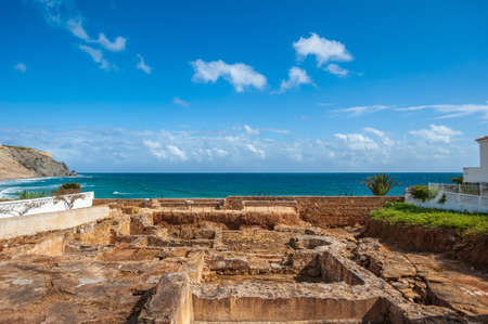 Praia da Luz, Portugal - March 25, 2018: Estacao Archeologica Romana. Ruins of a Roman villa with a spa and fish salt tanks in Praia da Luz in the Algarve in Portugalのeditorial素材