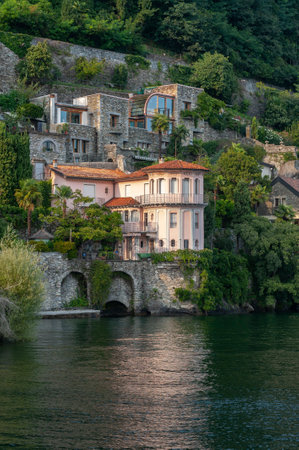 Cannero Riviera, Italy - August 9, 2018: Villas on the shore of Lake Maggiore in Cannero Riviera. Cannero Riviera is a town in the Piedmont region of Italyのeditorial素材