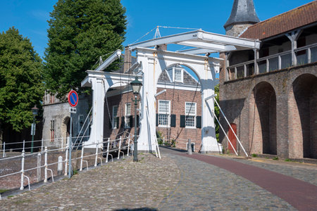 Canal bridge at the Old Port between Zuidhavenpoort and Noordhavenpoort in Zierikzee. Province of Zeeland in the Netherlandsの写真素材